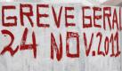 Ein Graffito an einer Wand in Porto: Portugals Gewerkschaften haben zum Generalstreik gegen die Sparpläne der Regierung aufgerufen. Foto: Jose Coelho Foto: dpa