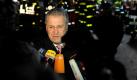 Der bayerische Innenminister Joachim Herrmann gibt in Stein an der Traun an der Unglückstelle ein Interview. Foto: dpa