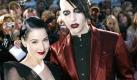 Unschuldig war Burlesque-Tänzerin Dita von Teese wohl nie. Das ist sie auch nicht in diesem Outfit an der Seite von Schockrocker Marilyn Manson. Foto: Jörg Carstensen/dpa 