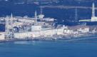 Fukushima Dai-ichi nuclear power plant is pictured before helicopters dump water on the stricken reactor to cool overheated fuel rods inside the core in Okumamachi, Fukushima Prefecture, Japan, Thursday morning, March 17, 2011.  Foto: dapd