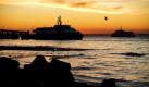 Morgenstimmung in Lissabon: Fähren kreuzen auf dem Fluss Tagus.  Foto: dapd