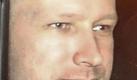 Anders Behring Breivik am 25.7. in einem Polizeiauto beim Verlassen des Gerichtsgebäudes in Oslo. Foto: dpa