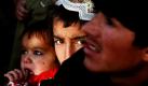 Drei Geschwister in Helmand in Afghanistan. Foto: ap