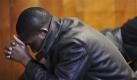 In der First Haitian Baptist Church in Norwich, US-Bundesstaat Connecticut, beten Menschen für die Erdbebenopfer auf Haiti. Elie Isaac und Caleb Roseme haben Familie und Freunde in dem Inselstaat. Foto: ap