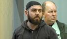 Der Angeklagte Adem Yilmaz vor der Urteilsverkündung vor dem Düsseldorfer Oberlandesgericht. Foto: dpa