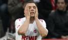 Nordrhein-Westfalen/ ARCHIV: Fussball, 1. Bundesliga, Saison 2011/12, 25. Spieltag, 1. FC Koeln - Hertha BSC, RheinEnergie Stadion, Koeln: Koelns Lukas Podolski haelt sich die Haende ans Gesicht (Foto vom 10.03.12). Das an Dramatik und Emotionen kaum zu ueberbietende Rot-Festival mit drei Platzverweisen gegen Hertha BSC toppte der 1. FC Koeln wenige Stunden spaeter mit einem Paukenschlag. Als die Spieler noch den im Abstiegskampf eminent wichtigen 1:0 (1:0)-Erfolg gegen Berlin feierten, wurden sie mit einer zunaechst kaum zu glaubenden Nachricht konfrontiert. Die Vereinsfuehrung hatte sich gut drei Stunden nach dem Schlusspfiff von Sportdirektor Volker Finke getrennt - letztlich wegen der anhaltenden Differenzen mit Trainer Stale Solbakken und grundsaetzlich verschiedener Auffassungen bei taktischen und personellen Entscheidungen. (zu dapd-Text)
Foto: Roberto Pfeil/dapd Foto: dapd