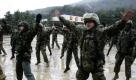 Südkoreanische und US-Marines wärmen sich beim Frühsport auf, bevor sie mit der harten Ausbildung desMountain Warfare (Gebirgskriegs) beginnen. Foto: ap