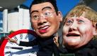Atomkraftgegner mit Gesichtsmasken, die Kanzlerin Merkel und FDP-Chef Rösler darstellen sollen, heben in Berlin vor dem Bundeskanzleramt vor einer Laufzeituhr der Atomkraftwerke gegen ein schnelleres Abschalten den Finger. Die Vorsitzenden der Ethik-Kommission haben am Vormittag ihren Bericht Sichere Energieversorgung an Bundeskanzlerin Merkel übergeben. Die CDU-FDP-Koalition hatte sich in der Nacht auf den Atomausstieg bis spätestens 2022 geeinigt. Foto: dpa