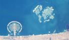 300 Inseln aus Sand zeigen vor der Küste Dubais die Welt im Kleinformat. Zu erkennen ist das Muster jedoch nur aus dem All: Das Foto stammt von der International Space Station (ISS).
 Foto: ap