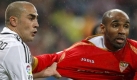Real Madrids Italian defender Fabio Cannavaro (L) fights for the ball with Sevilla?s Mali striker Frederic Kanoute during their Spanish Primera Division soccer match at Santiago Bernabeu stadium in Madrid, central Spain, 07 December 2008.

 Foto: dpa