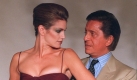 American top model Cindy Crawford and Italian designer Valentino at a restricted photo call 07 July in Paris, a day before she is due to take part in his 1997/98 Fall/Winter high fashion collection. She wears a long, shoulderless plum and lime green velvet-like dress.
 Foto: dpa