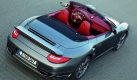 Wenn das Beste gerade gut genug ist und die Sonne nicht nur im Herzen mitfahren soll: den Porsche 911 Turbo gibt es auch als Cabrioversion - für 157.057 Euro. Neben den Fahrleistungen ist bei ihm übrigens auch das schmucke Dreispeichen-Lenkrad das gleiche. Foto: press-inform