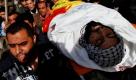 Eine palästinensische Trauergemeinde trägt einen Leichnam durch Gaza-Stadt. Der Mann wurde bei einem israelischen Luftangriff getötet. 
 Foto: ap