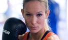 Die Kickboxerin Christine Theiss posiert am Dienstag (10.05.11) in Muenchen in einem Fitnessstudio. Besser koennte die Vorlage fuer die Kickbox-Queen mit dem Arzt-Patent nicht sein. Gleich nach dem Champions-League-Finale FC Barcelona - Manchester United, am 28. Mai, darf sie ran. Christine Theiss will als amtierende Weltmeisterin gegen die Suedkoreanerin Su Jeong Lim ihren Titel verteidigen. Das erste Mal uebertraegt Sat.1 den gesamten Kampf live. Als Zugpferd soll sie aufgebaut werden, fuer gute Quoten in einer Randsportart sorgen. Da verwundert es nicht, dass die gebuertige Thueringerin, die mit ihren Eltern 1984 nach Bayreuth zog, aeusserst selbstbewusst herueberkommt. 'Ueber den Fall, was nach einer Niederlage sein sollte, denke ich nicht nach', sagt sie laut und wird deutlicher, 'diese Moeglichkeit gibt es nicht, weil ich gewinnen werde.' (zu dapd-Text)
Foto: Lennart Preiss/dapd Foto: dapd