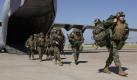 U.S.-Marines verlassen am Mittwoch (03.03.04) ein C-17 Globemaster III Transportflugzeug auf dem Flughafen von Port-au-Prince auf Haiti. Insgesamt 1.500 Mann U.S.-Truppen sind auf Haiti stationiert, um die politische Lage zu stabilisieren. Foto: USAF/ Andy Dunaway/ ddp
 Foto: ddp