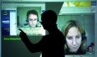 Der Psychologe Stefan Münzer, Mitarbeiter im Bereich 'Concert' des Darmstädter Fraunhofer Instituts Integrierte Publikations- und Informationssysteme (IPSI), demonstriert am Freitag (26.10.2001) beim Tag der offenen Tür des Instituts die Möglichkeit des Lernens per Videokonferenz an einem interaktiven Großbildschirm. Insgesamt zwanzig Organisationen arbeiten im Leitprojekt 'L3 - Lebenslanges Lernen - Weiterbildung als Grundbedürfnis' zusammen, um die Vision einer technischen und organisatorischen Infrastruktur zur lebenslangen Weiterbildung zu verwirklichen. Unter der Projektleitung der Walldorfer Firma SAP wird eine Plattform für die Aus- und Weiterbildung von erwachsenen Lernern oder zur Mitarbeiterschulung entwickelt. Unterstützt wird das L3-Konsortium vom Bundesministerium für Bildung und Forschung.
 Foto: dpa