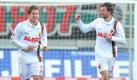 Augsburgs Stephan Hain (r) erzielte 20 Sekunden nach seiner Einwechslung das 2:2 gegen den FCK. Foto: Stefan Puchner Foto: dpa