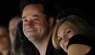 Das Schauspielerpaar Anna Loos und Jan Josef Liefers hat Spaß bei der Fashion Week. Foto: dpa