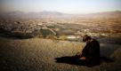 Ein afghanischer Mann betet auf einem Hügel in Kabul, Afghanistan.  Foto: ap