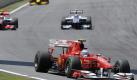 Fernando Alonso steuert seinen Ferrari hinter dem Spitzenduo durch das Rennen. Foto: dpa