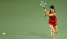 Jelena Jankovic aus Serbien mit einem Return gegen Vesnina während der dritten Runde der Toray Pan Pacific Open in Tokia. Foto: dpa