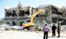 Libyen räumt auf: Nach dem Tod von Ex-Machthaber Muammar Gaddafi will Libyen mit seiner Vergangenheit restlos aufräumen. Mit Baggern rissen die Rebellen das Haus des Despoten in Tripolis ab. Nichts soll mehr an die Schreckensherrschaft erinnern. Foto: dapd