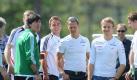 Bundestrainer Joachim Löw begrüßt Michael Schumacher und Nico Rosberg im DFB-Trainingslager in Tourrettes. Foto: Andreas Gebert Foto: dpa