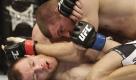 Der Engländer Marc Scanlon (l.) wird von dem Deutschen Pascal Krauss (r.) auf die Bretter geschickt. Die beiden Raufbolde kämpfen ganz professionell um den Sieg bei den Meisterschaften im Weltergewicht des Ultimate Fighting Championship (UFC) in Oberhausen. Krauss gewann nach drei Runden.
 Foto: ap