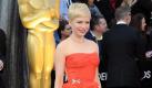 Sie war eine von Streeps Konkurrentinnen: Michelle Williams beeindruckte im Film als Marilyn Monroe und auf dem roten Teppich mit schulterfreiem orangefarbenem Kleid. Foto: dpa