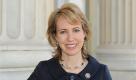 FILE - In this March, 2010 file photo provided by the office of Rep. Gabrielle Giffords, Giffords poses for a photo. She loves motorcycles and yoga, and is as comfortable in a business suit walking the halls of Congress as she is clad in leather riding gear at the famed Sturgis Motorcycle Rally. She holds a master's degree in urban planning, yet can mount a tire in a flash. Pretty and petite, sometimes soft-spoken, she will take on even her most ardent   adversaries and try talking them down with a firm hand but also a smile. Said one friend of Gabrielle Giffords: She really pretty much defies a lot of description.  (AP Photo/Office of Rep. Gabrielle Giffords, File) Foto: ap