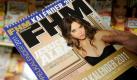 Ein Mann posiert am Freitag (26.11.10) in einem Zeitungsgeschaeft in Berlin mit dem Magazin FHM in der Hand. Laut Medienberichten vom Freitag schliesst die Egmont Holding die Verlagstochter Mitte Editionen, in der unter anderem das Maennermagazin FHM erscheint. Foto: Oliver Lang/dapd Foto: ddp