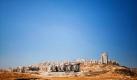 In einer jüdischen Siedlung in Jerusalem werden neue Wohngebäude errichtet. Noch bevor  überhaupt Friedensgespräche mit den Palästinensern aufgenommen wurden, diskutiert die israelische Regierung bereits den langsameren Aufbau von jüdischen Wohnkomplexen im Westjordanland. Foto: ap