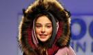 Ein Kindermodel präsentiert im italienischen Florenz auf der weltgrößten Kindermodemesse, der Pitti Immagine Bimbo, eine Kollektion des italienischen Modelabels Woolrich. Die alljährliche Modeveranstaltung für die Kleinen geht noch bis Samstag.  Foto: dapd