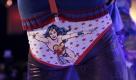 Ein Mitglied des Teams Die Gefurztagskinder des Zorns trägt bei der Weltmeisterschaft im Hässlichtanzen einen Wonderwoman-Slip mit Hosenträgern zu einem Strickpullunder. Foto: dapd