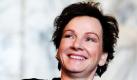 Karin Beier, die künftige Intendantin des Deutschen Schauspielhauses, lächelt während eines Treffens mit Hamburgs designierten Bürgermeister Olaf Scholz. Im Anschluß an dieses Treffen unterzeichnete Beier im Rathaus der Hansestadt ihren Vertrag. Foto: dpa