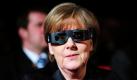 Bundeskanzlerin Angela Merkel hat sich in Berlin während der Berlinale in Erwartung des Filmbeginns des Streifens Pina von Wim Wenders eine 3-D Brille aufgesetzt. Foto: dapd