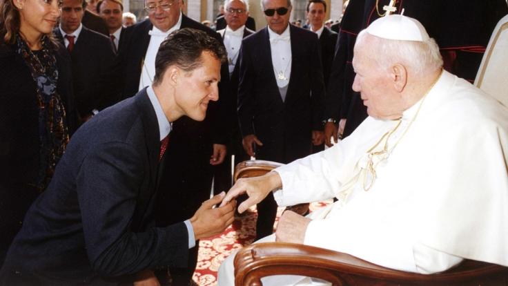 Michael Schumacher im Jahre 1999 bei Papst Johannes Paul II.