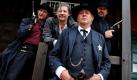 Die Schauspieler Martin Semmelrogge als Colby (von links nach rechts), Claude Oliver Rudolph als Frank Miller, Jan Fedder als Sheriff Clint und Martin May als Ben Miller posieren in Bad Segeberg auf dem Set des Großstadtreviers. Die 300. Folge mit dem Titel Eines Tages um 5 nach 12 Uhr mittags wurde als Western inszeniert und soll voraussichtlich am 10. Januar 2011 in der ARD ausgestrahlt werden. Foto: dpa