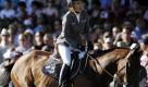 Die Springreiterin Meredith Michaels-Beerbaum reitet beim großen Preis von Aachen auf ihrem Pferd Shutterfly zum vierten Platz.. Eric Lamaze (Kanada) auf Hickstead gewann vor Pius Schwizer (Schweiz) auf Cartina und Sergio Alvarez Moya (Spanien) auf Action-Breaker. Foto: ddp