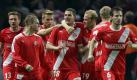 Die Spieler von Fortuna Düsseldorf feiern den Sieg bei der Hertha. Foto: Kay Nietfeld Foto: dpa