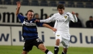 Bielefelds Arne Feick (l) und der Aachener Florian Müller im Laufduell. Foto: dpa