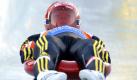 Felix Loch of Germany speeds down the track in the first race of the Men`s Luge World Cup competition in Altenberg, Germany, Saturday, Dec. 5, 2009. (AP Photo/Matthias Rietschel) Foto: ap
