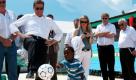 Außenminister Guido Westerwelle kickt mit einem Jungen mit einer Beinprothese im Hauptquartier der Hilfsorganisation Johanniter International in Leogane (Haiti). Westerwelle traf sich in Haiti mit Vertretern von Nichtregierungsorganisationen und besuchte das Hilfsprojekt der Johanniter. Foto: dapd
