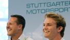 Michael Schumacher (l) und Nico Rosberg präsentierten den neuen Silberpfeil. Foto: Marijan Murat Foto: dpa