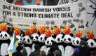 Klimaaktivisten, die als brennende Pandabären verkleidet sind, demonstrieren in Kopenhagen anlässlich der Weltklimakonferenz für mehr Klimagerechtigkeit.
 Foto: ddp