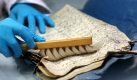 Das Historische Stadtarchiv Köln galt bis zu seinem Einsturz am 3. März als eines der größten Kommunalarchive Europas. Es umfasste 30 Regalkilometer an Dokumenten, darunter 65.000 Urkunden ab dem Jahr 922, 1800 mittelalterliche Handschriften und Evangeliare, 10.000 Testamente und die Protokolle des Kölner Stadtrates seit 1320. Foto: dpa