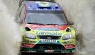 Mikko Hirvonen aus Finnland steuert mit Landsmann und Co-Fahrer Jarmo Lehtinen einen Ford WRC durch eine schlammige Strecke auf der Rally of Wales. Die Rennen, die sich bis zum Sonntag hinziehen, finden im dortigen Sweet Lamb statt. Foto: dapd