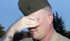 ** CORRECTS SPELLING OF QUANTICO ** Marine Sgt. David Budwah, right, hides his face as he leaves LeJuene Hall after his court marshal hearing at the Quantico Marine Base in Quantico, Va., Wednesday, Oct. 21, 2009. Budwah was sentenced Wednesday to 18 months confinement and fined $25,000 for pretending to be an injured war hero to get free seats at rock concerts and professional sporting events. Budwah also will be reduced in rank to private and dishonorably discharged after any appeals. He must forfeit all pay and benefits during his confinement and is subject to up to 3 1/2 years of additional prison time if he re-offends within two years. (AP Photo/Steve Helber) Foto: ap