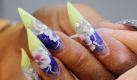Stiletto-Nails gehören zu den Trends der Internationalen Kosmetikmesse Beauty International in Düsseldorf. Foto: dpa