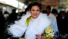 Eine 20-jährige japanische Frau hat sich mit einem traditionellen Kimono festlich zurecht gemacht, um im Rahmen einer Zeremonie in Tokio ihren Einstand in die Welt der Erwachsenen zu feiern. Heiraten dürfen Japanerinnen zwar schon im Alter von 16, aus dem Jugendalter entschlüpfen sie aber erst mit 20 Jahren. Ab da darf dann geraucht, getrunken und gewählt werden.  Foto: dpa